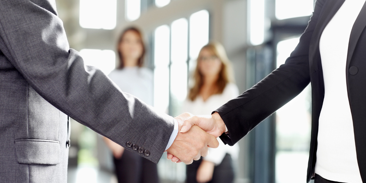 Business people handshake at office.